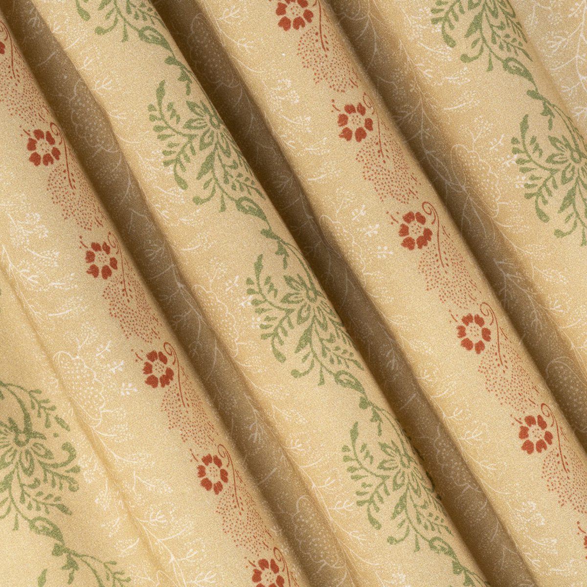 Original Schürzenstoff der Klosterneuburger Tracht aus goldgelber 3-färbiger Baumwolle Schürzenstreif